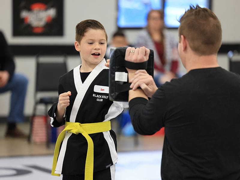 Children practicing martial arts in Holland, developing lifelong discipline, focus, and self-respect.